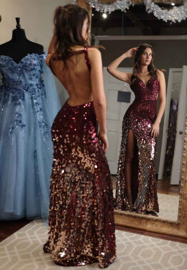 Two-toned burgundy and gold sequin prom dress with open back and fitted silhouette. when to buy prom dress