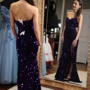 Turn heads in this rich purple fitted prom dress, featuring a luxurious velvet sequin design and a structured corset top for the perfect fit. Fitted purple velvet sequin prom dress with corset top for a glamorous and structured look.