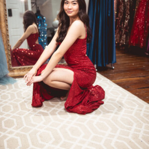Steal the spotlight in this stunning red fitted sequin prom dress, designed to sparkle with every step. Fitted red sequin prom dress with a sleek silhouette for a bold and radiant look.