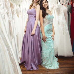 From soft lilac satin with sparkling A/B stones to a mint sheer top gown with intricate beadwork—two enchanting styles perfect for prom 2025! Lilac satin A-line prom dress with A/B stone details and mint sheer top gown with intricate beaded pattern for a dazzling look. prom dress rental vs purchase